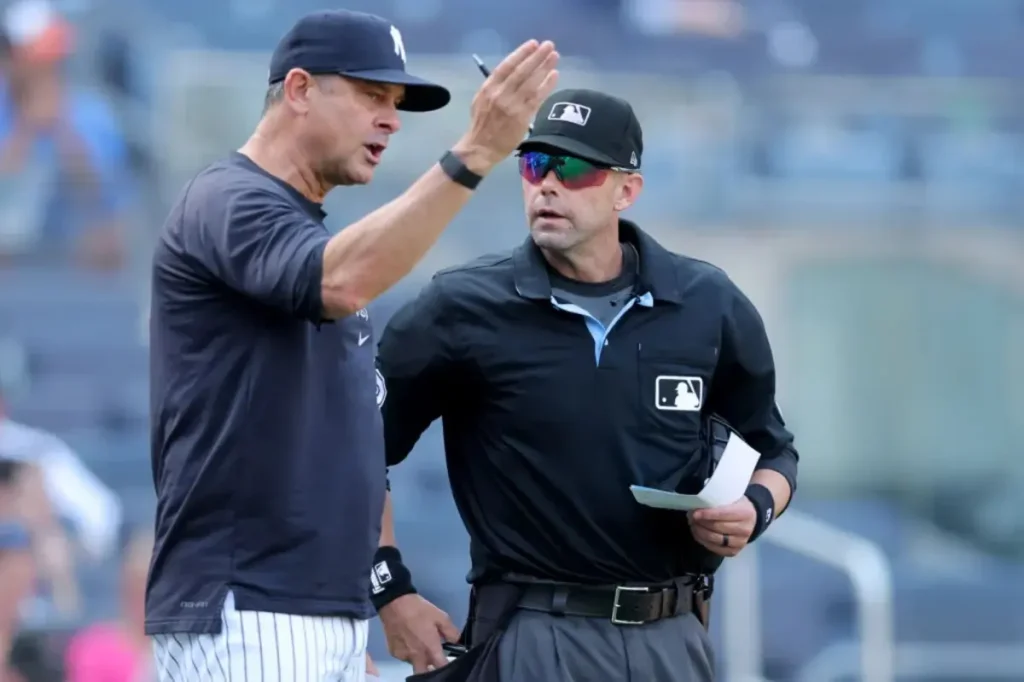Aaron Boone criticizes 'overly sensitive' umpires following his ejection from the game.