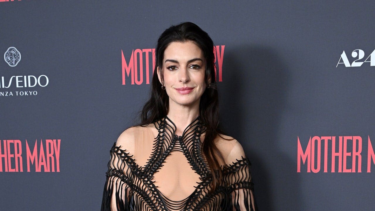 Anne Hathaway impresses in a dark gown at the London premiere of 'Mother Mary'