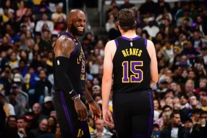 Austin Reaves doesn't replicate the famous Dwyane Wade pose following LeBron James' alley-oop in the Lakers' victory against the Cavaliers.