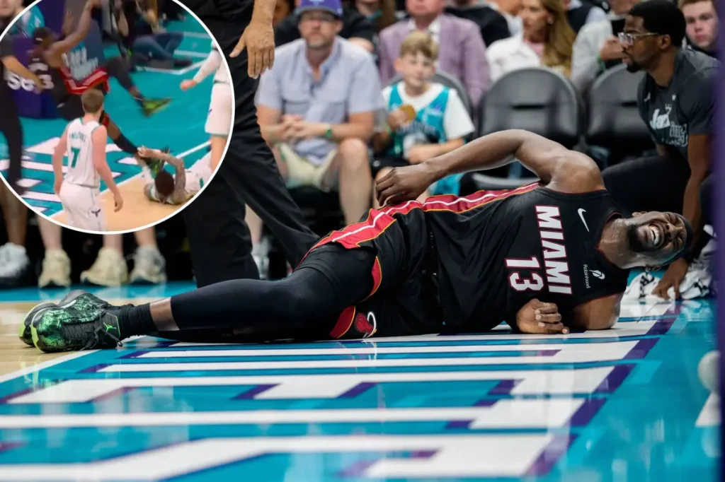 Bam Adebayo leaves play-in game due to back injury following clash with Lamelo Ball