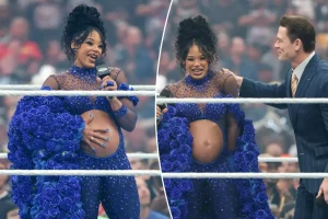 Bianca Belair shares her pregnancy news in a surprise during WrestleMania.