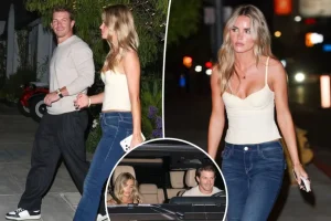 Braxton Berrios seen with a model as he avoids issues with Alix Earle