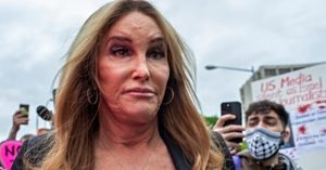Caitlyn Jenner feels remorse for accepting the 'Woman' award and seeks entry to women's restrooms.