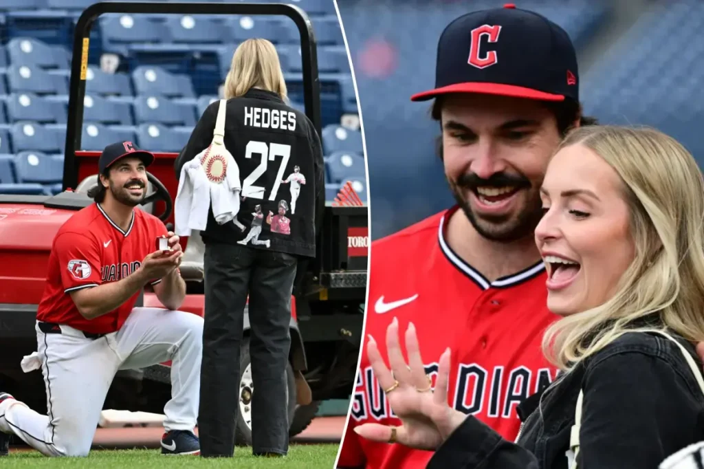 Catcher Austin Hedges of the Guardians proposes to his girlfriend following a victory.