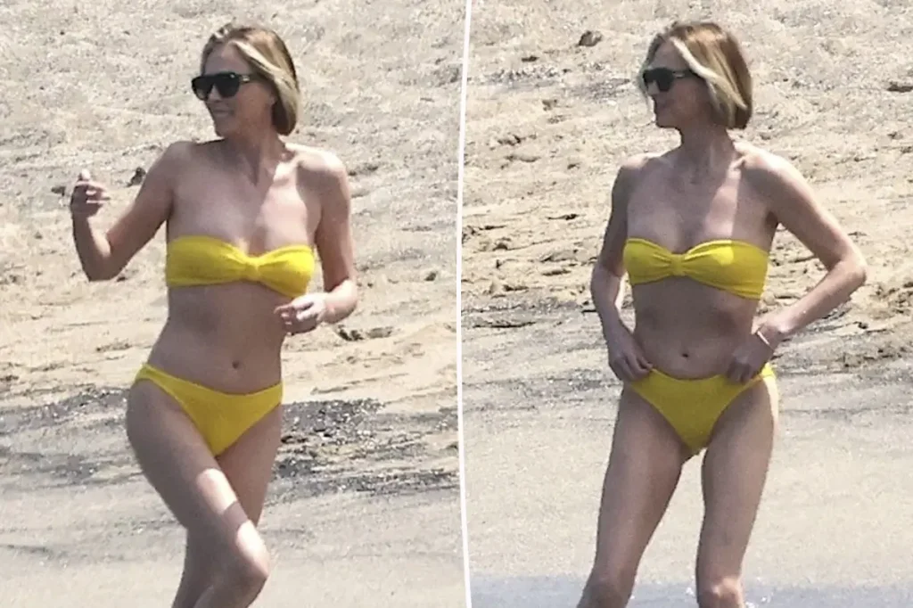 Charlize Theron shows off a strapless bikini during her vacation in Hawaii