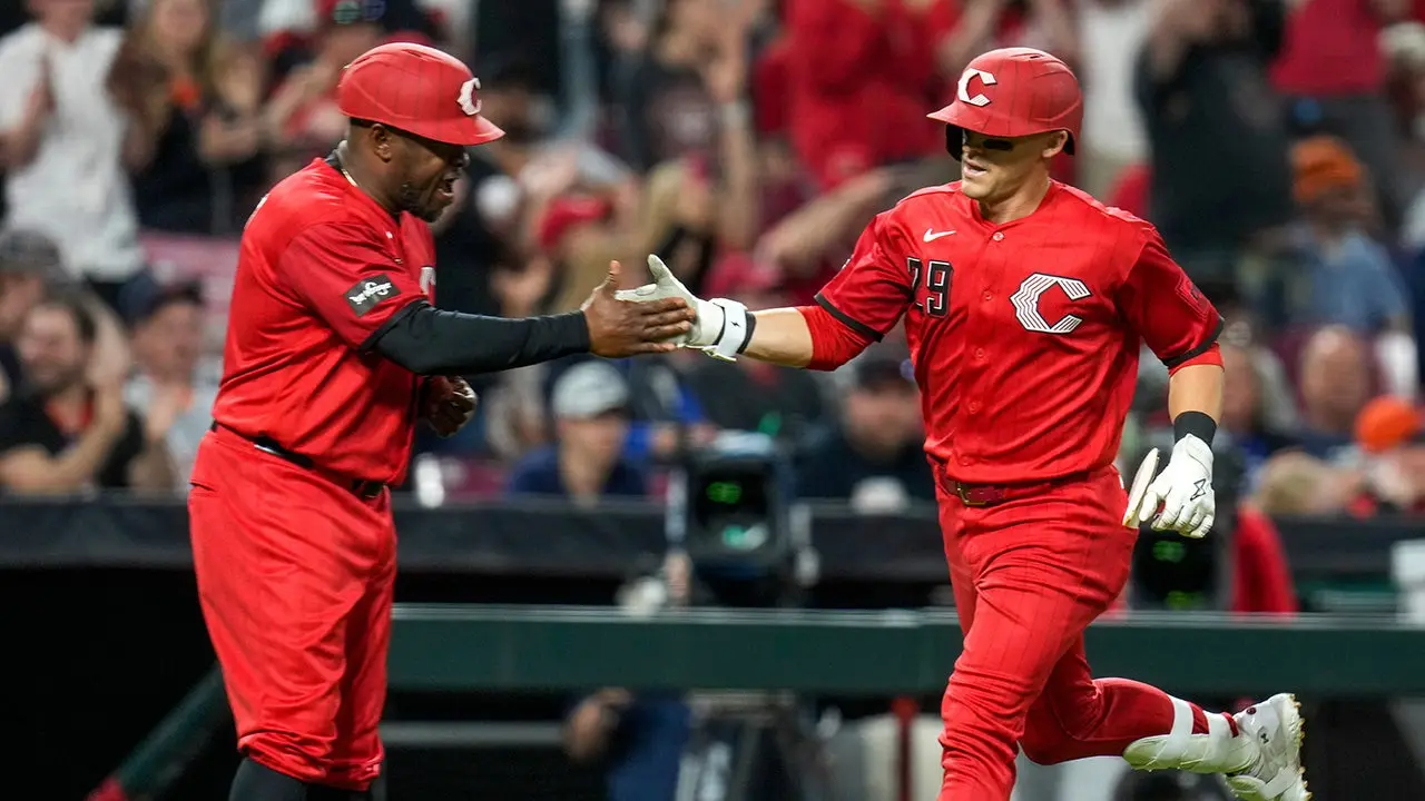 Cincinnati Reds showcase their City Connect uniforms, which are a disaster.