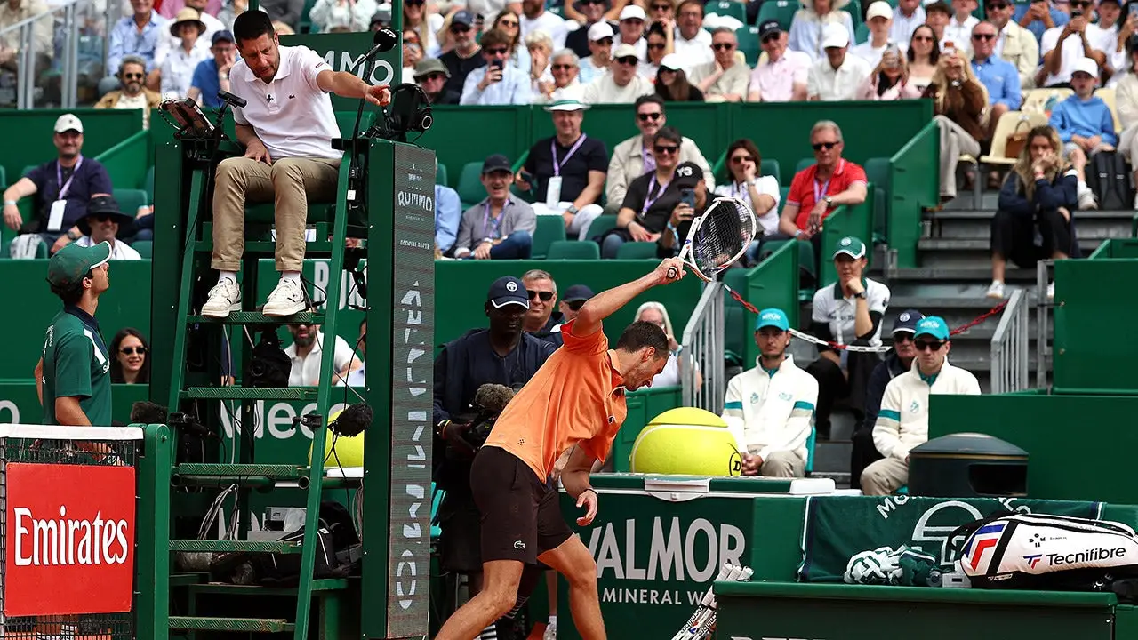 Daniil Medvedev receives a code violation following a racket outburst during a 6-0, 6-0 defeat.