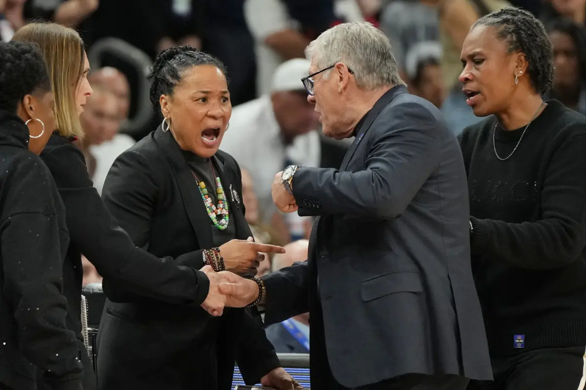 Dawn Staley encourages fans to 'move on' after her conversation with Geno Auriemma.