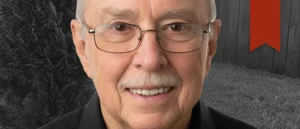 Dr. Gerald Robison: A Life Committed to Belief and Assisting Others