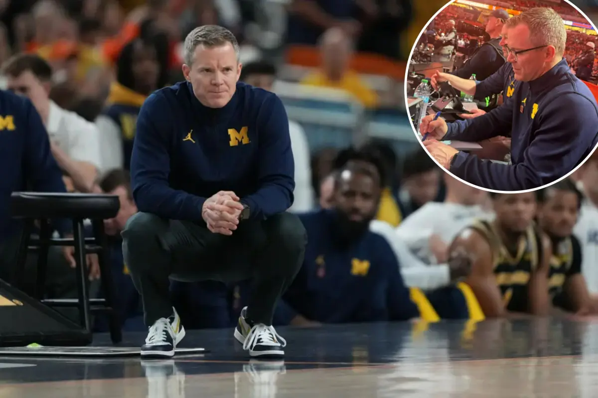 Dusty May was watching UConn-Illinois from the sidelines prior to Michigan's Final Four match.