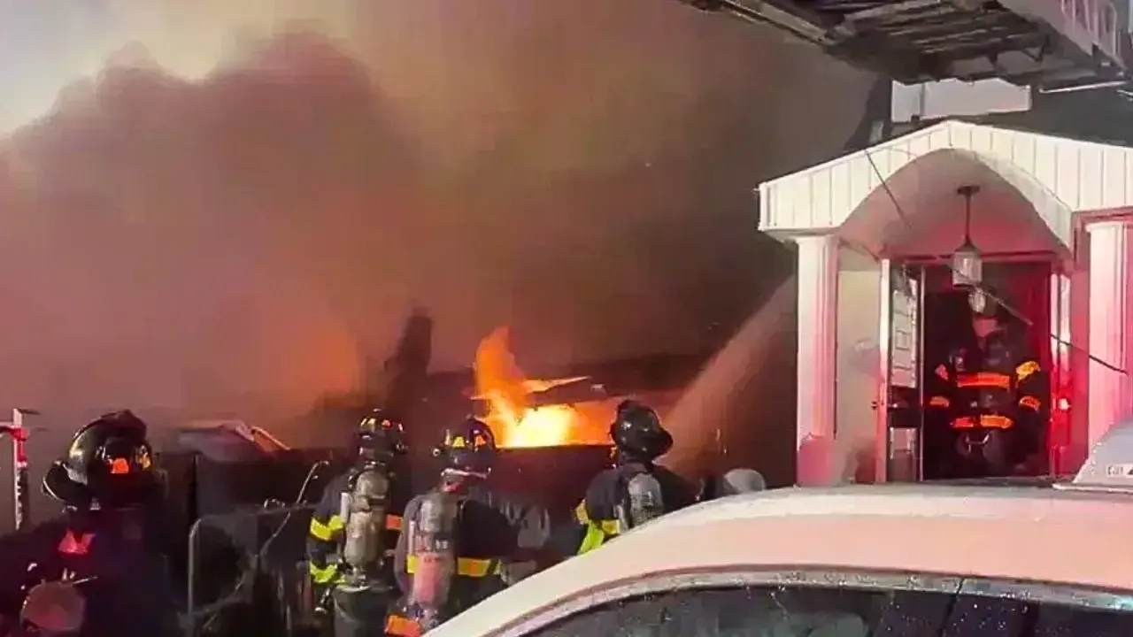 Eight police officers hurt in Queens explosion while responding to a domestic incident.