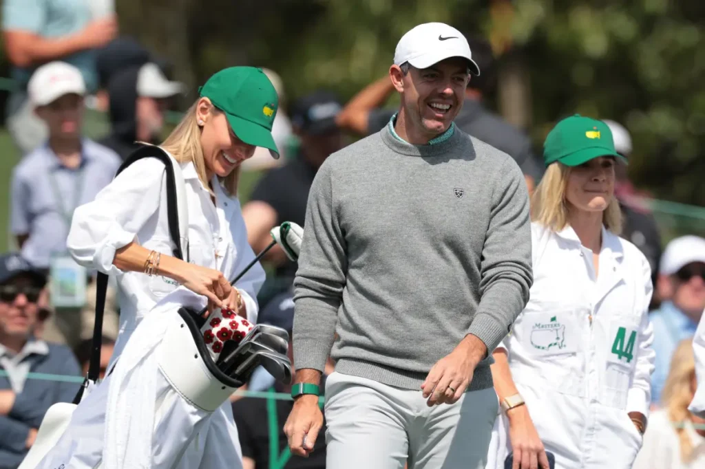 Erica Stoll accompanies Rory McIlroy at the Masters following revelations about their divorce.