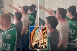 Fans are banned for connection to supposed Nazi gesture in viral clip.