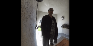 Father hurries home to safeguard his child and pregnant wife from an unstable man shouting threats at their door, insisting it be opened.