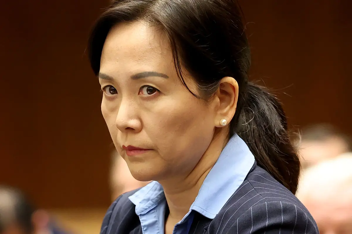 Former LAUSD worker Grace Peng shows no emotion in court