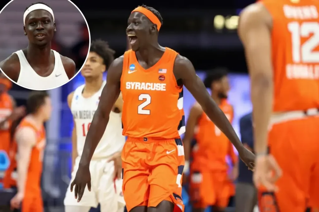 Former Syracuse basketball player John Bol Ajak faces deportation.