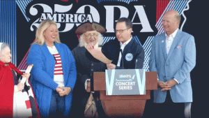 Governor Shapiro came close to being struck by a collapsing backdrop during the America250 event.