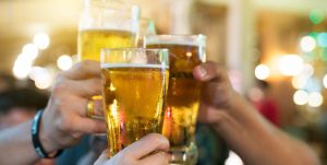 Here's What Drinking Beer Daily Can Do, According to Experts