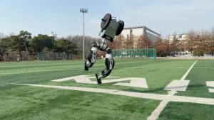 Humanoid robot from KAIST walks, kicks, and moonwalks during real-world testing.