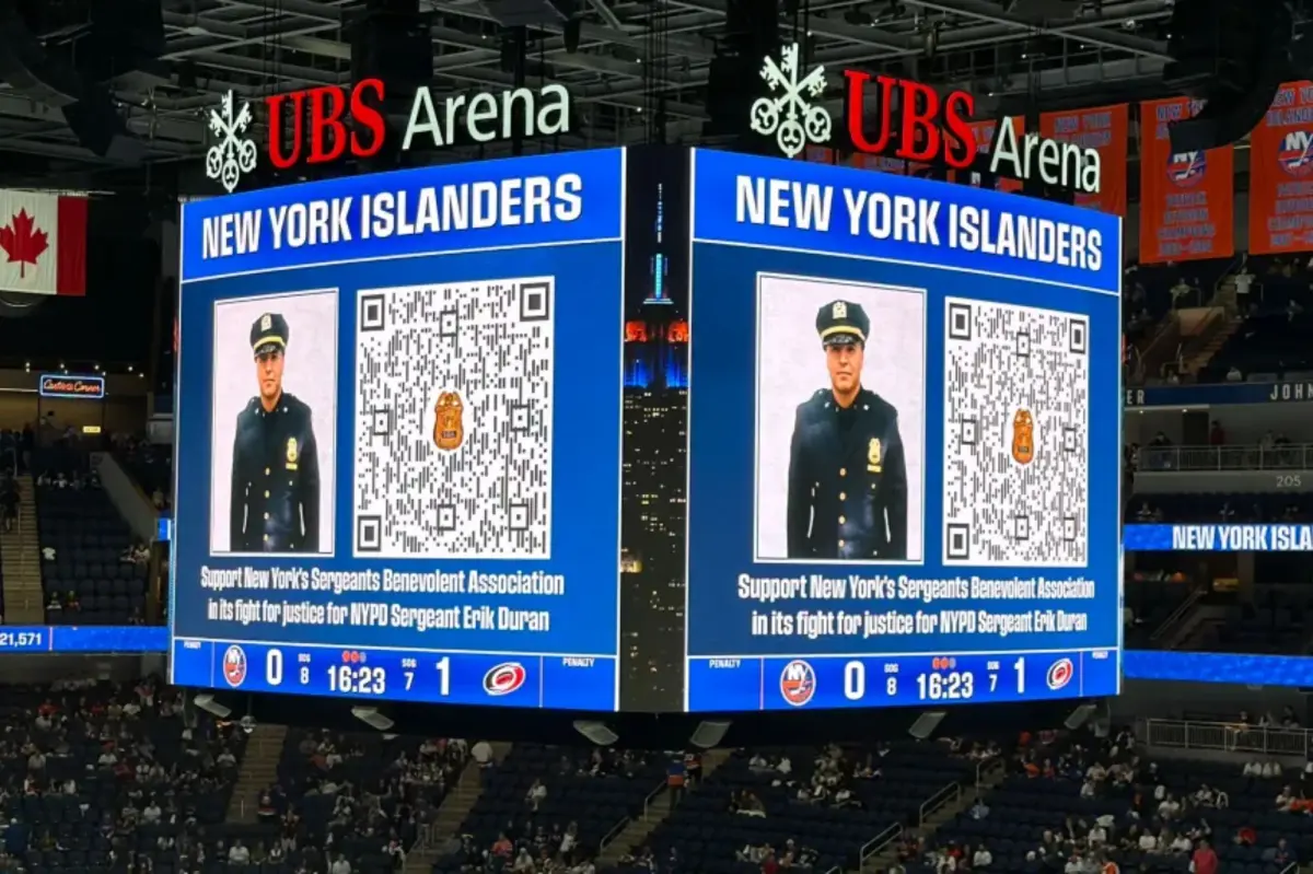 Islanders supporters unite in support of imprisoned 'cooler cop' Erik Duran following the establishment of a legal defense fund.