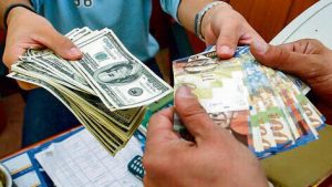 Israelis hurry to purchase dollars, leading to a countrywide shortage