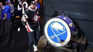 Josh Allen downs a beer to energize the Sabres fans