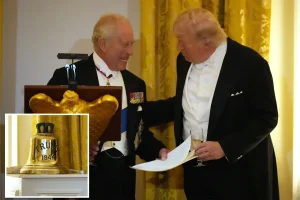 King Charles III presents the president with a bell from HMS Trump at the state dinner in the White House