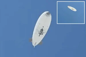 Large empty white airship raises concerns in isolated town