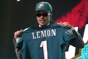 Makai Lemon feels overwhelmed on NFL draft night after touching family videos.