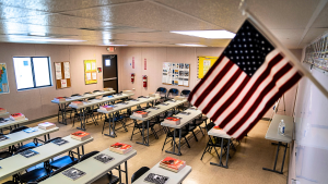 Nude images appeared on the screen at school while the district starts an investigation