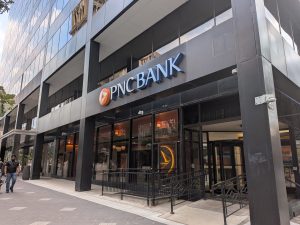PNC plans to reduce its workforce at FirstBank by up to 777 employees after the merger, with some already receiving new job offers.