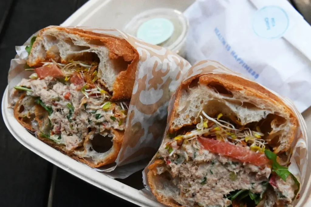 Pura Vida Miami alters menu following backlash over its popular tuna sandwich.