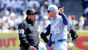Royals manager Matt Quatraro is removed from the game before his team pitches against the Yankees.