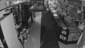 Security footage shows robbers taking $100,000 from Chicago card store.
