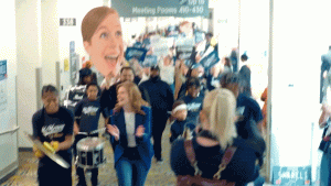 Senate hopeful McMorrow's arrival with a marching band sparks comparisons to Harris