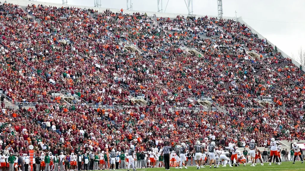 Spring game at Virginia Tech postponed due to skydiver getting stuck on scoreboard