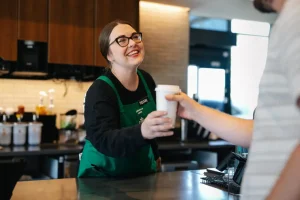 Starbucks plans to give baristas $1,200 bonuses to improve their speed and friendliness.