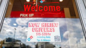 Stocks experiencing significant changes before the market opens: Qualcomm, Domino's Pizza, Adobe, and more