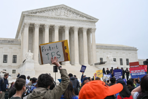 Supreme Court listens to arguments regarding the Trump administration's attempts to terminate TPS for Haitians and Syrians.