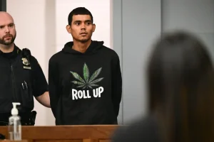 Suspected drug dealer arrives at Long Island court wearing a very noticeable hoodie