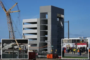 Terrifying footage reveals a Philadelphia parking garage collapse, resulting in one death and trapping two additional workers.