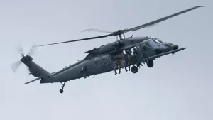 Troops save injured airman in Iran following a two-day search.