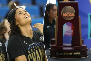 UCLA women's basketball team rejoices with supporters