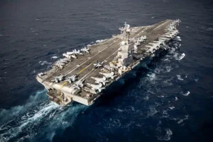 USS Gerald Ford returns after a historic deployment related to the Iran conflict and the capture of Maduro.
