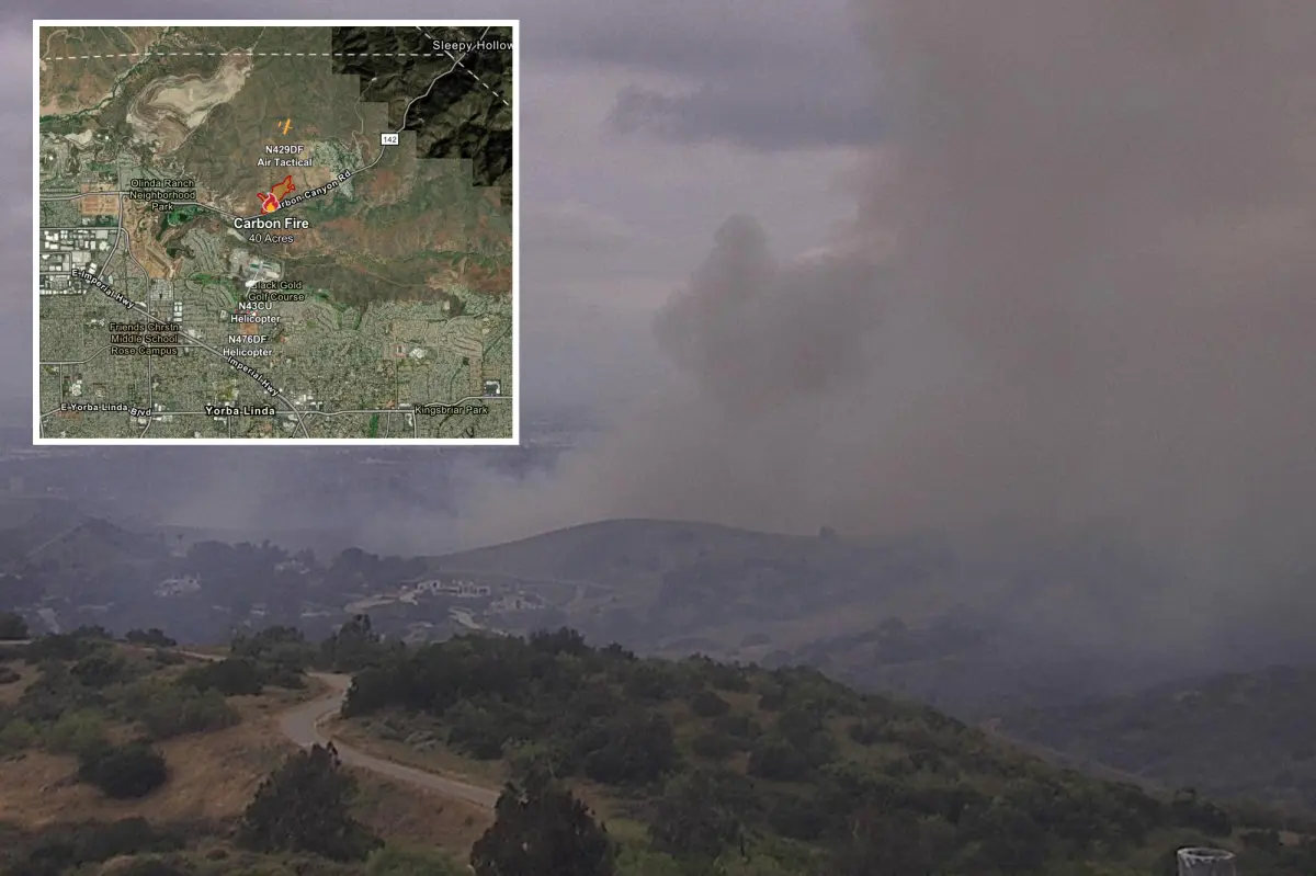 Wind intensifies brush fire in OC, leading to road closures and evacuation alerts