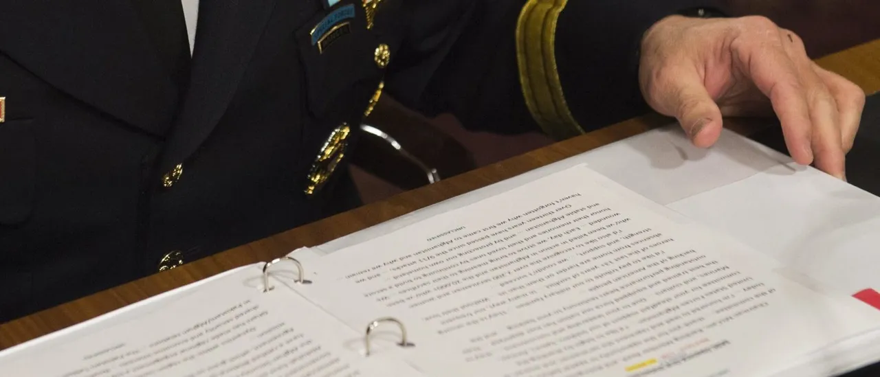 Woman Accused of Delivering Secret Army Information to Reporter