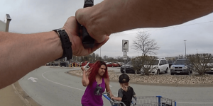 Woman attacks 3-year-old boy she took from Walmart, prompting police to shoot.