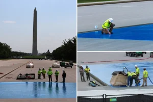 Workers apply blue coating to the Reflecting Pool at Lincoln Memorial