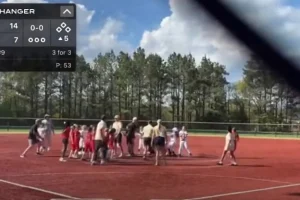 Youth softball coach in Georgia confronts opponent on pitcher's mound in video-recorded brawl