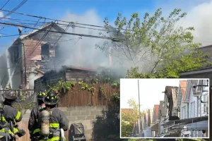 14 people hurt, with 12 being firefighters, as a rapidly spreading fire damages homes in NYC.